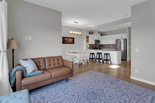 311 Sunrise View, Cochrane, AB - Indoor Photo Showing Living Room