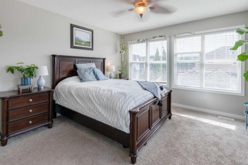 311 Sunrise View, Cochrane, AB - Indoor Photo Showing Bedroom