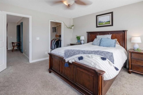 311 Sunrise View, Cochrane, AB - Indoor Photo Showing Bedroom