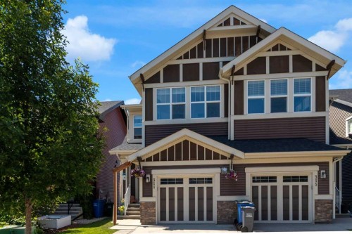 311 Sunrise View, Cochrane, AB - Outdoor With Facade