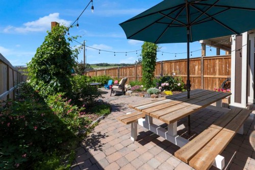 311 Sunrise View, Cochrane, AB - Outdoor With Deck Patio Veranda