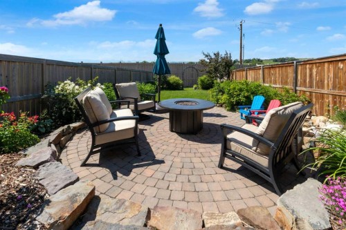 311 Sunrise View, Cochrane, AB - Outdoor With Deck Patio Veranda