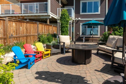 311 Sunrise View, Cochrane, AB - Outdoor With Deck Patio Veranda