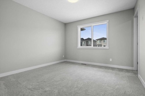 55 Agate Road, Cochrane, AB - Indoor Photo Showing Other Room