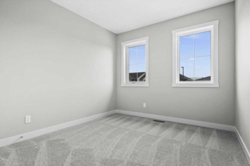 55 Agate Road, Cochrane, AB - Indoor Photo Showing Other Room