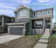 55 Agate Road, Cochrane, AB  - Outdoor With Facade 