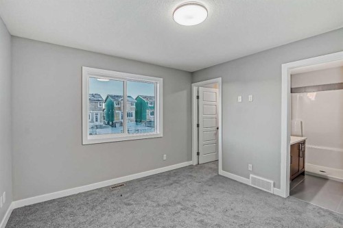55 Agate Road, Cochrane, AB - Indoor Photo Showing Other Room