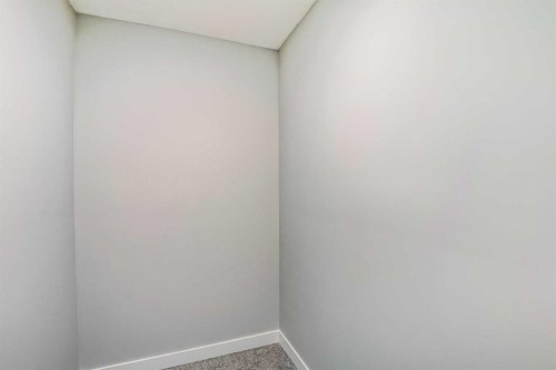 55 Agate Road, Cochrane, AB - Indoor Photo Showing Other Room