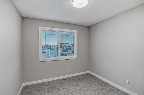 55 Agate Road, Cochrane, AB - Indoor Photo Showing Other Room