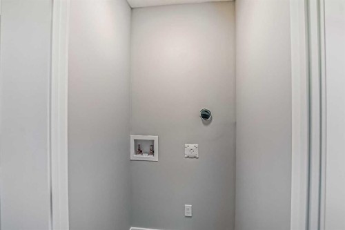 55 Agate Road, Cochrane, AB - Indoor Photo Showing Other Room