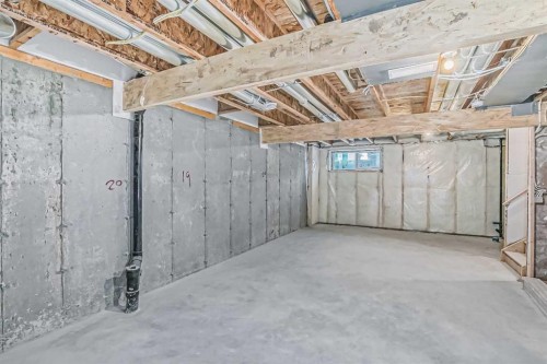 55 Agate Road, Cochrane, AB - Indoor Photo Showing Basement
