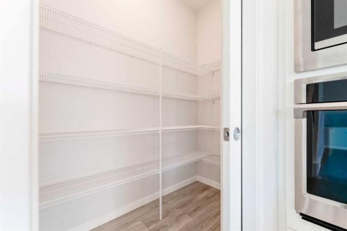 16 West Grove Link Sw, Calgary, AB - Indoor With Storage