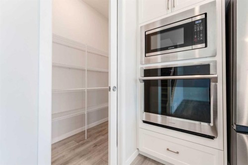 16 West Grove Link Sw, Calgary, AB - Indoor Photo Showing Kitchen