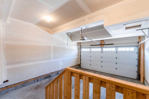 16 West Grove Link Sw, Calgary, AB - Indoor Photo Showing Garage