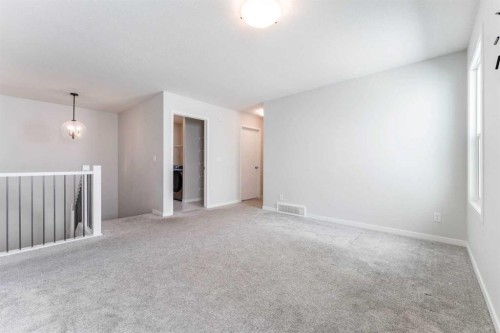 16 West Grove Link Sw, Calgary, AB - Indoor Photo Showing Other Room