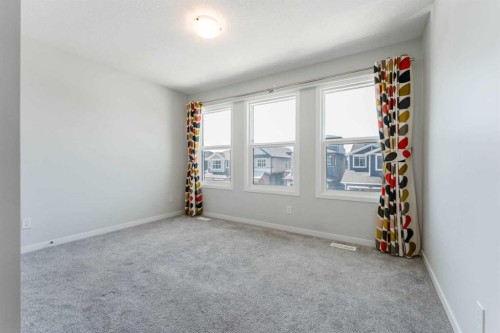 16 West Grove Link Sw, Calgary, AB - Indoor Photo Showing Other Room