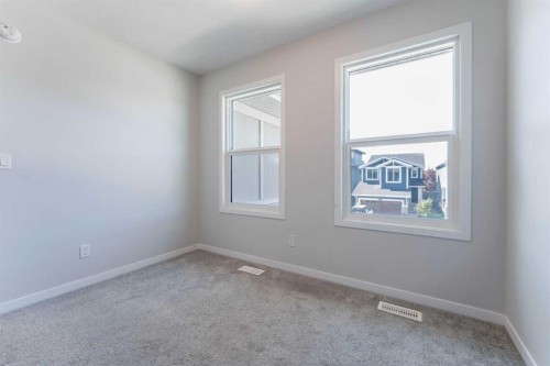 16 West Grove Link Sw, Calgary, AB - Indoor Photo Showing Other Room