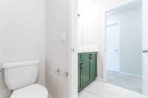 16 West Grove Link Sw, Calgary, AB - Indoor Photo Showing Bathroom