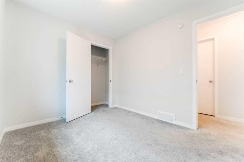 16 West Grove Link Sw, Calgary, AB - Indoor Photo Showing Other Room