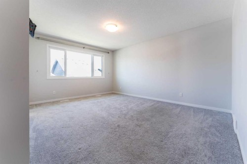 16 West Grove Link Sw, Calgary, AB - Indoor Photo Showing Other Room