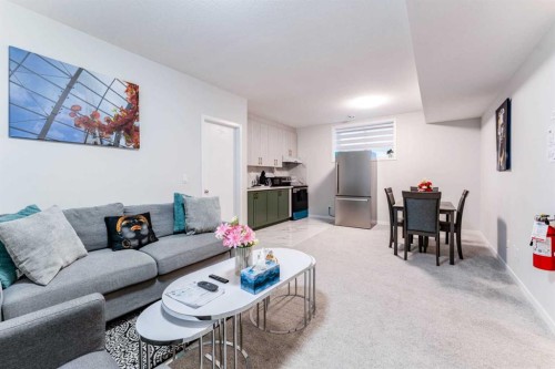 16 West Grove Link Sw, Calgary, AB - Indoor Photo Showing Living Room