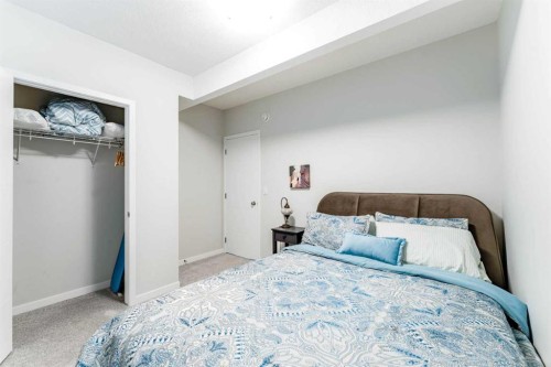 16 West Grove Link Sw, Calgary, AB - Indoor Photo Showing Bedroom