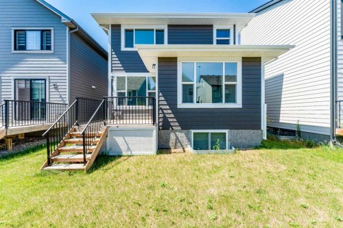 16 West Grove Link Sw, Calgary, AB - Outdoor With Facade