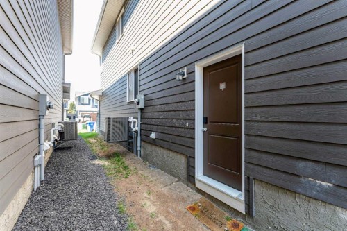 16 West Grove Link Sw, Calgary, AB - Outdoor With Exterior