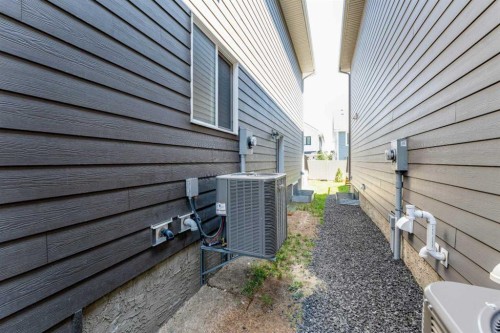 16 West Grove Link Sw, Calgary, AB - Outdoor With Exterior