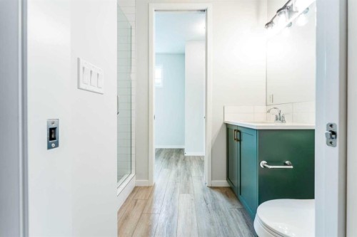 16 West Grove Link Sw, Calgary, AB - Indoor Photo Showing Bathroom