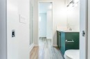 16 West Grove Link Sw, Calgary, AB  - Indoor Photo Showing Bathroom 