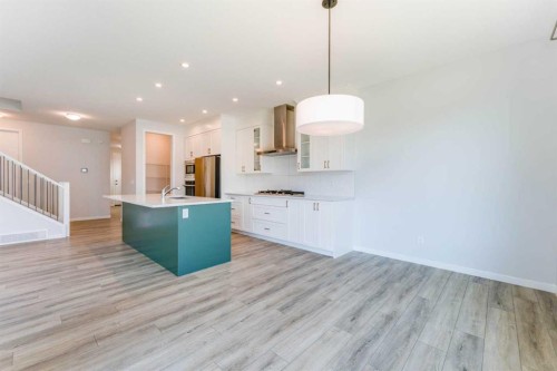 16 West Grove Link Sw, Calgary, AB - Indoor Photo Showing Kitchen With Upgraded Kitchen