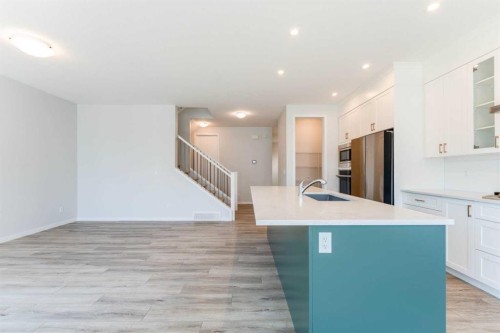 16 West Grove Link Sw, Calgary, AB - Indoor Photo Showing Kitchen With Upgraded Kitchen
