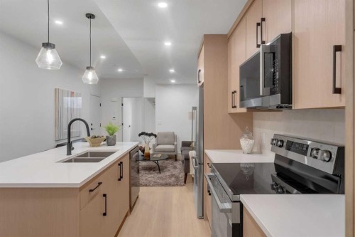 2136 5 Avenue Nw, Calgary, AB - Indoor Photo Showing Kitchen With Double Sink With Upgraded Kitchen
