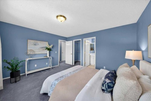 232 Douglas Glen Close Se, Calgary, AB - Indoor Photo Showing Bedroom