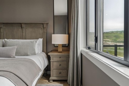 220 Precedence View, Cochrane, AB - Indoor Photo Showing Bedroom