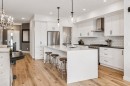 220 Precedence View, Cochrane, AB  - Indoor Photo Showing Kitchen With Upgraded Kitchen 