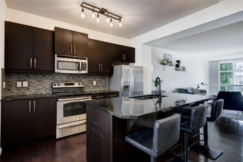 1058 New Brighton Park Se, Calgary, AB - Indoor Photo Showing Kitchen With Stainless Steel Kitchen With Upgraded Kitchen