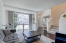 1058 New Brighton Park Se, Calgary, AB  - Indoor Photo Showing Living Room 