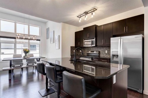 1058 New Brighton Park Se, Calgary, AB - Indoor Photo Showing Kitchen With Stainless Steel Kitchen With Upgraded Kitchen
