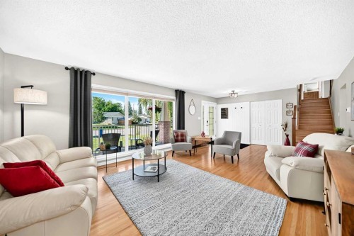 10416 Mapleridge Crescent Se, Calgary, AB - Indoor Photo Showing Living Room