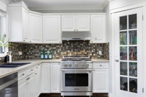 13 Somerset Park Sw, Calgary, AB - Indoor Photo Showing Kitchen With Double Sink