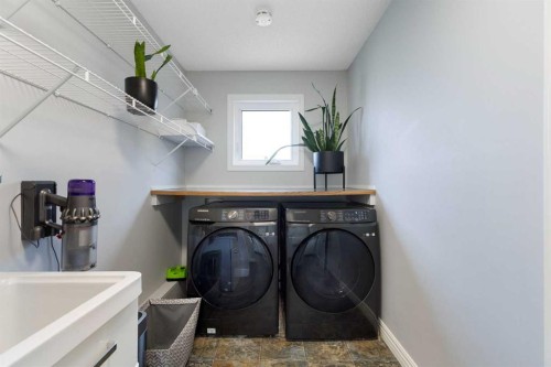 13 Somerset Park Sw, Calgary, AB - Indoor Photo Showing Laundry Room