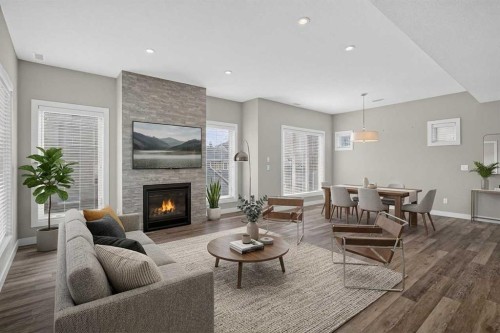 4-2416 30 Street Sw, Calgary, AB - Indoor Photo Showing Living Room With Fireplace