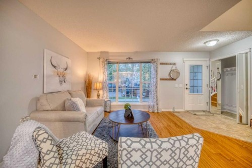 81 Prestwick Avenue Se, Calgary, AB - Indoor Photo Showing Living Room