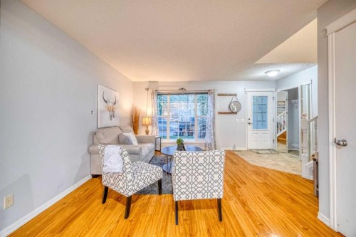 81 Prestwick Avenue Se, Calgary, AB - Indoor Photo Showing Living Room