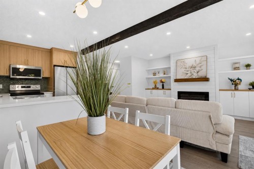 40-14736 Deerfield Drive Se, Calgary, AB - Indoor Photo Showing Other Room With Fireplace