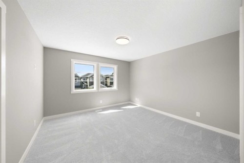 78 Sora Gardens Se, Calgary, AB - Indoor Photo Showing Other Room