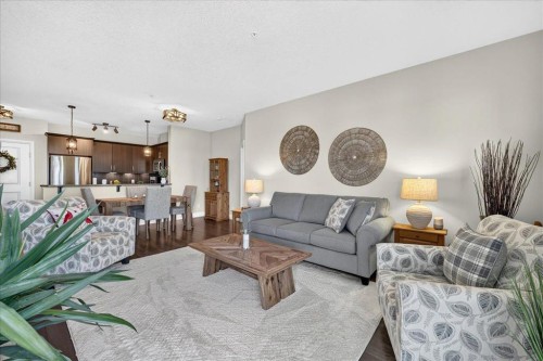 2305-15 Sunset Square, Cochrane, AB - Indoor Photo Showing Living Room