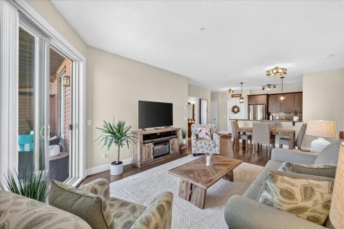 2305-15 Sunset Square, Cochrane, AB - Indoor Photo Showing Living Room